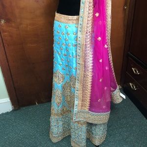 Light blue with gold embroidery